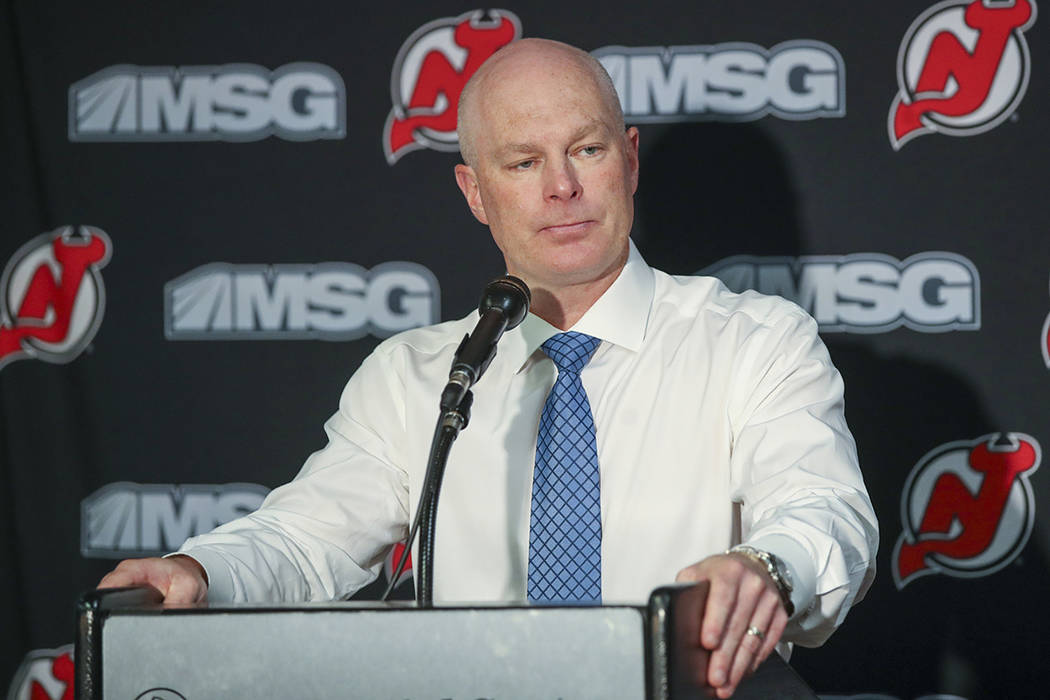 FILE - In this Monday, Oct. 14, 2019 file photo, New Jersey Devils head coach John Hynes talks ...