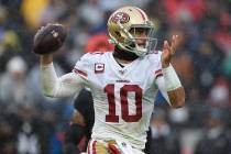 San Francisco quarterback Jimmy Garoppolo throws the ball against the Baltimore Ravens in the f ...