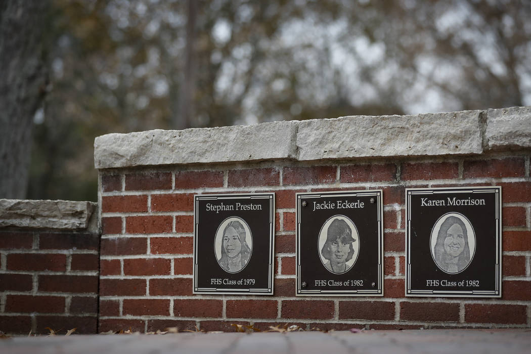 In this Thursday, Nov. 21, 2019 photo, the faces of the three Finneytown students killed in a s ...