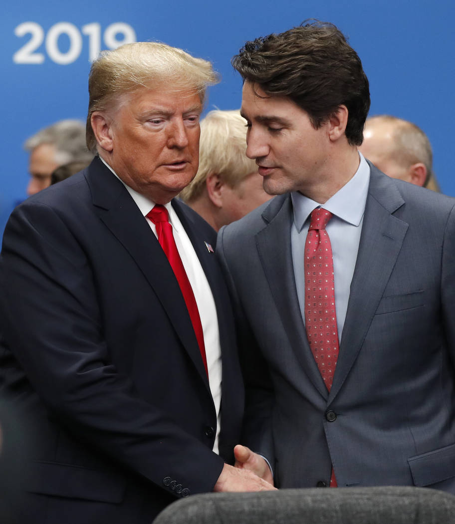 U.S. President Donald Trump, left, and Canadian Prime Minister Justin Trudeau shake hands prior ...