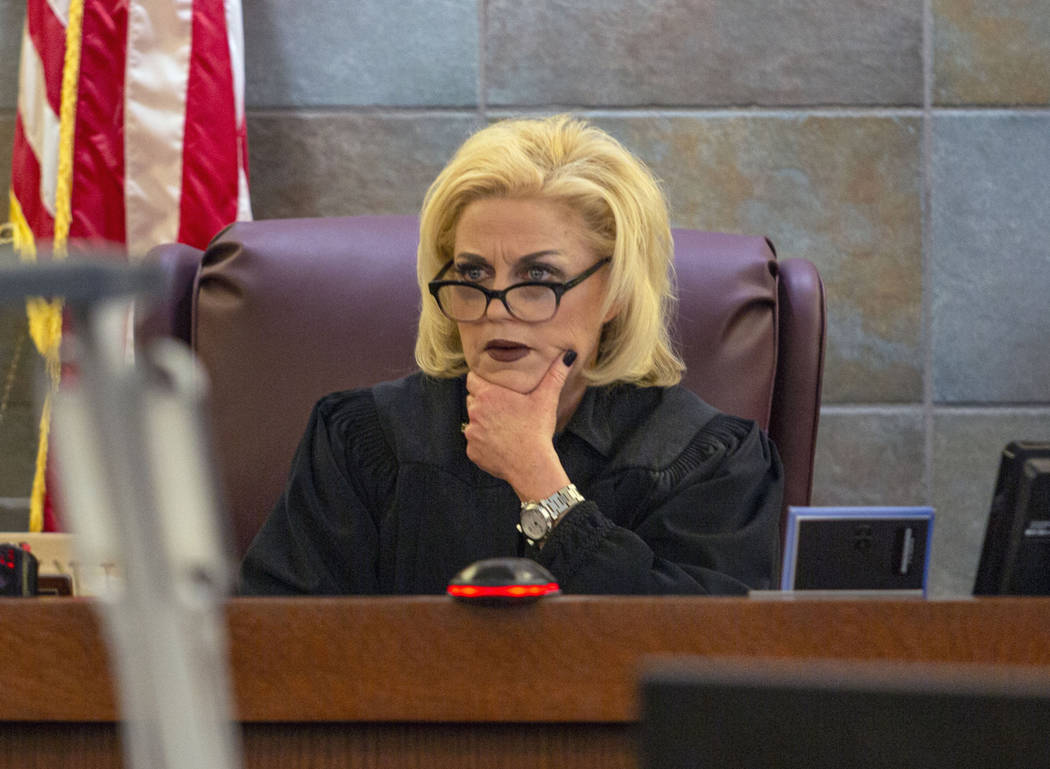 District Judge Michelle Leavitt listens to defense attorney Richard Schonfeld speak on behalf o ...
