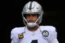 Oakland Raiders quarterback Derek Carr (4) waits in a tunnel to take the field prior to an NFL ...
