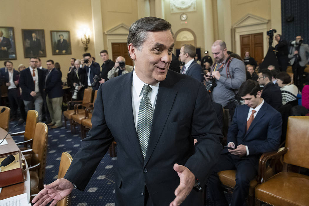 George Washington University Law School professor Jonathan Turley arrives to testify for a hear ...