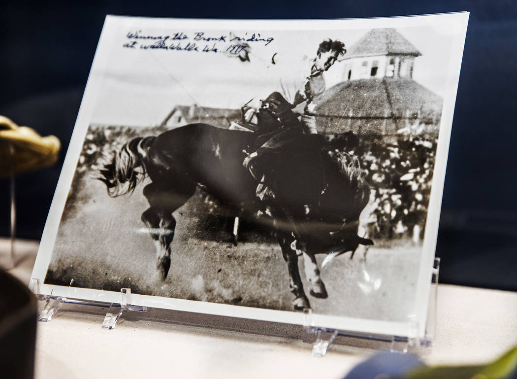 Memorabilia at the "John Wayne: Spirit of the West" interactive exhibit on Wednesday ...