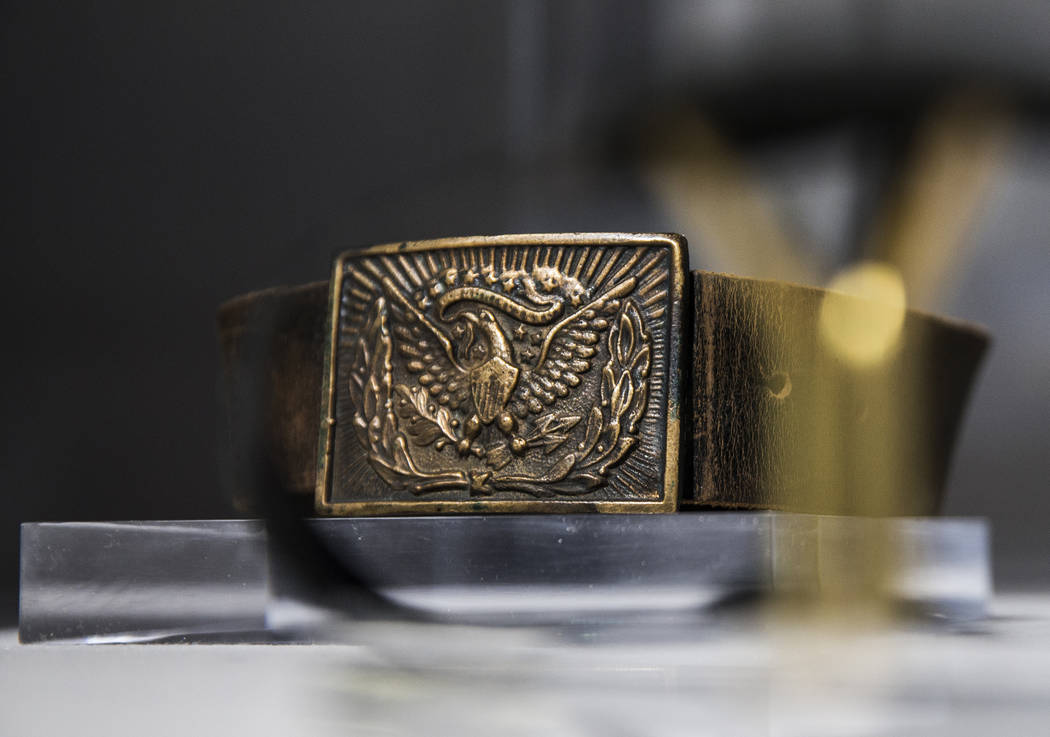 A custom leather belt with American bald eagle buckle worn on screen by film icon John Wayne at ...