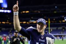 Tennessee Titans quarterback Ryan Tannehill (17) runs off the field following an NFL football g ...