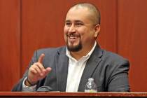 FILE- In this Sept. 13, 2016 file photo, George Zimmerman smiles as he testifies in a Seminole ...
