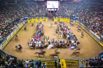 Contestants enter the arena during the opening ceremony on the first night of the National Fina ...