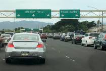 Traffic backs up at the main gates after a shooting at Pearl Harbor Naval shipyard, Wednesday, ...