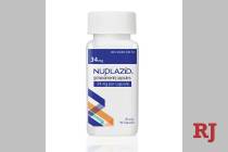 This undated photo provided by Acadia Pharmaceuticals Inc. shows a bottle of Nuplazid, a drug t ...