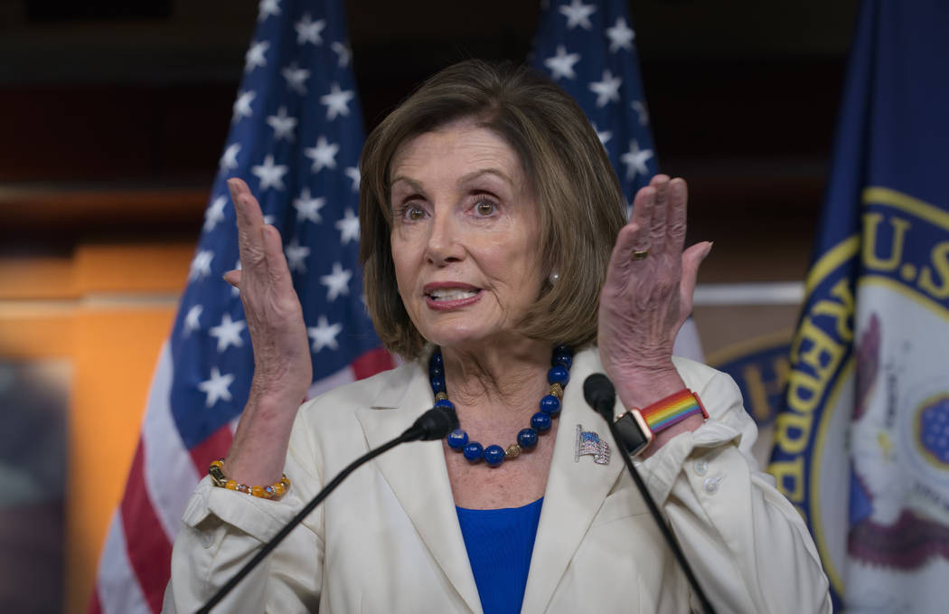 Speaker of the House Nancy Pelosi, D-Calif., talks to reporters as the House Intelligence Commi ...