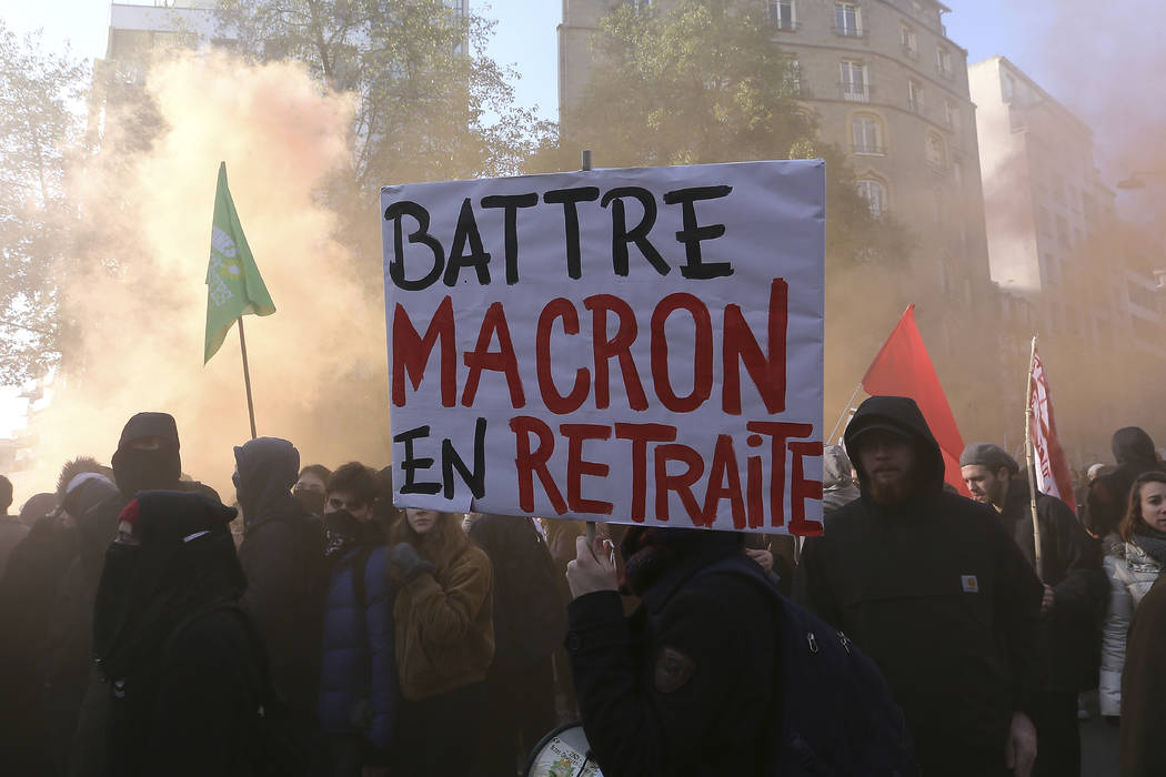 Protesters demonstrate in Rennes, western France, Thursday, Dec. 5, 2019. Unions launched natio ...