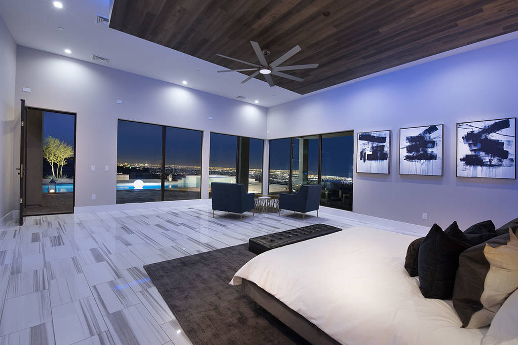 The master suite opens to an outdoor deck. (Synergy Sotheby’s International Realty)