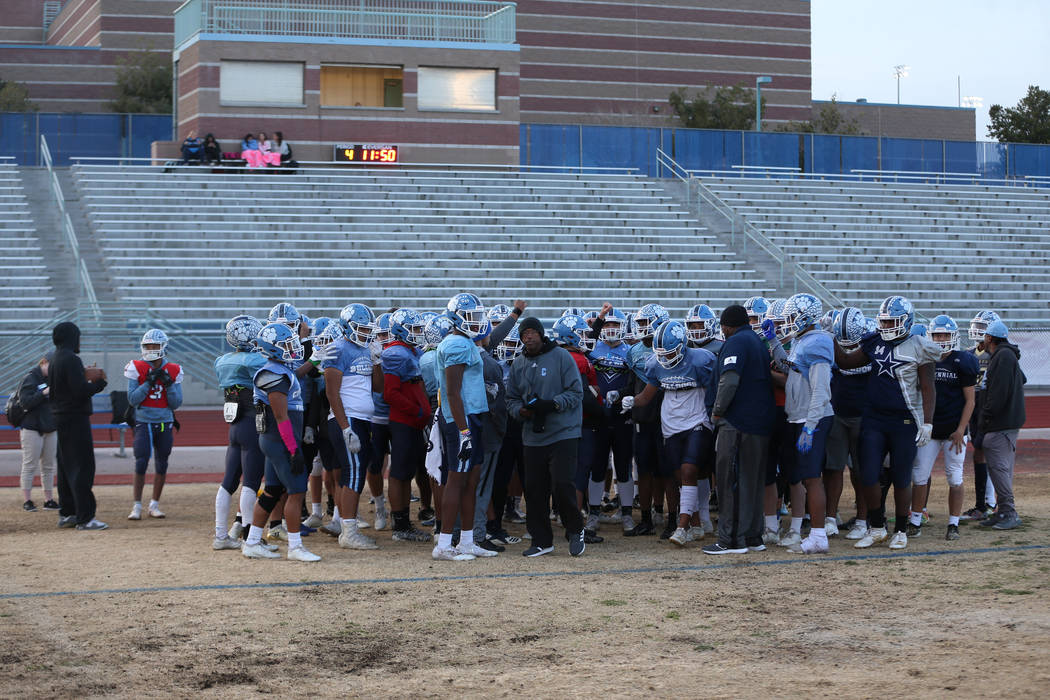 Centennial players huddle during a team practice at Centennial High School in Las Vegas, Thursd ...