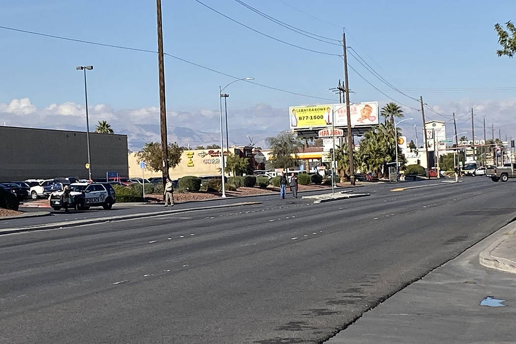 A large police presence has Nellis Boulevard closed in both directions between Charleston Boule ...