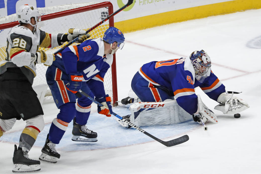New York Islanders goaltender Semyon Varlamov (40) makes a save as Vegas Golden Knights left wi ...