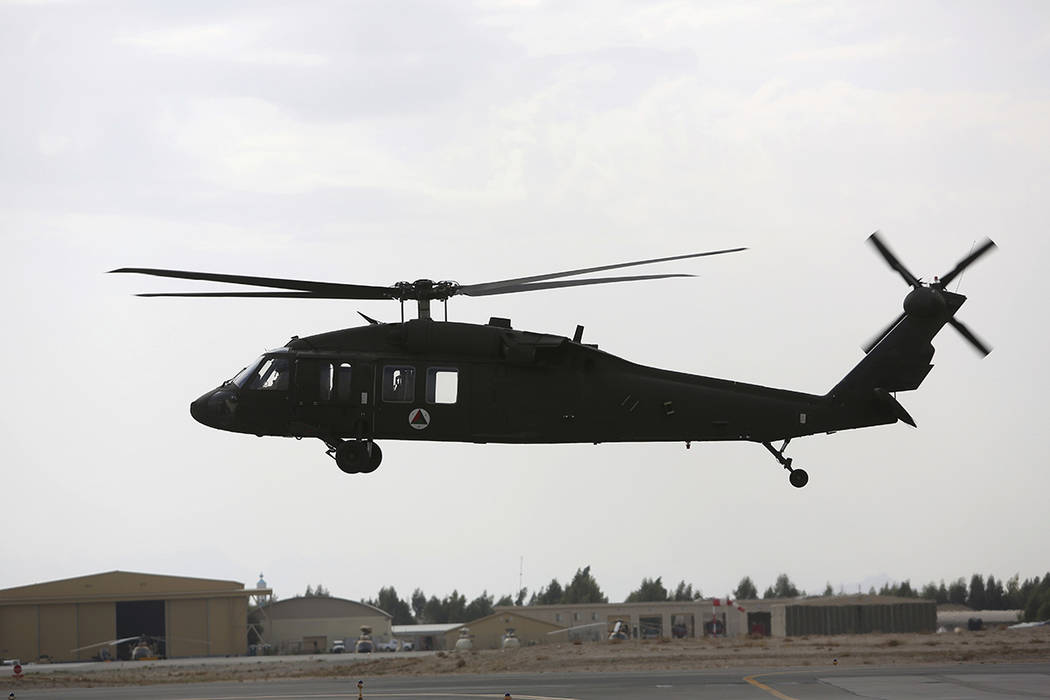 In this Monday, March 19, 2018 photo, UH-60 Black Hawk helicopters carrying US and Afghan train ...