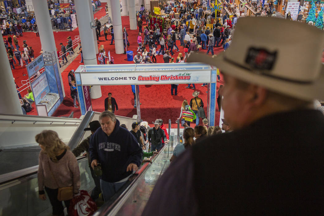 Individuals attend Cowboy Christmas at the Las Vegas Convention Center in Las Vegas on Thursday ...