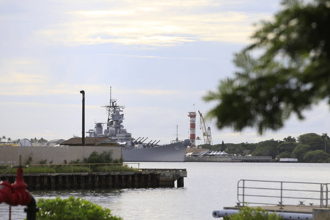A U.S. naval ship can been seen from Pearl Harbor National Memorial Wednesday, Dec. 4, 2019, in ...