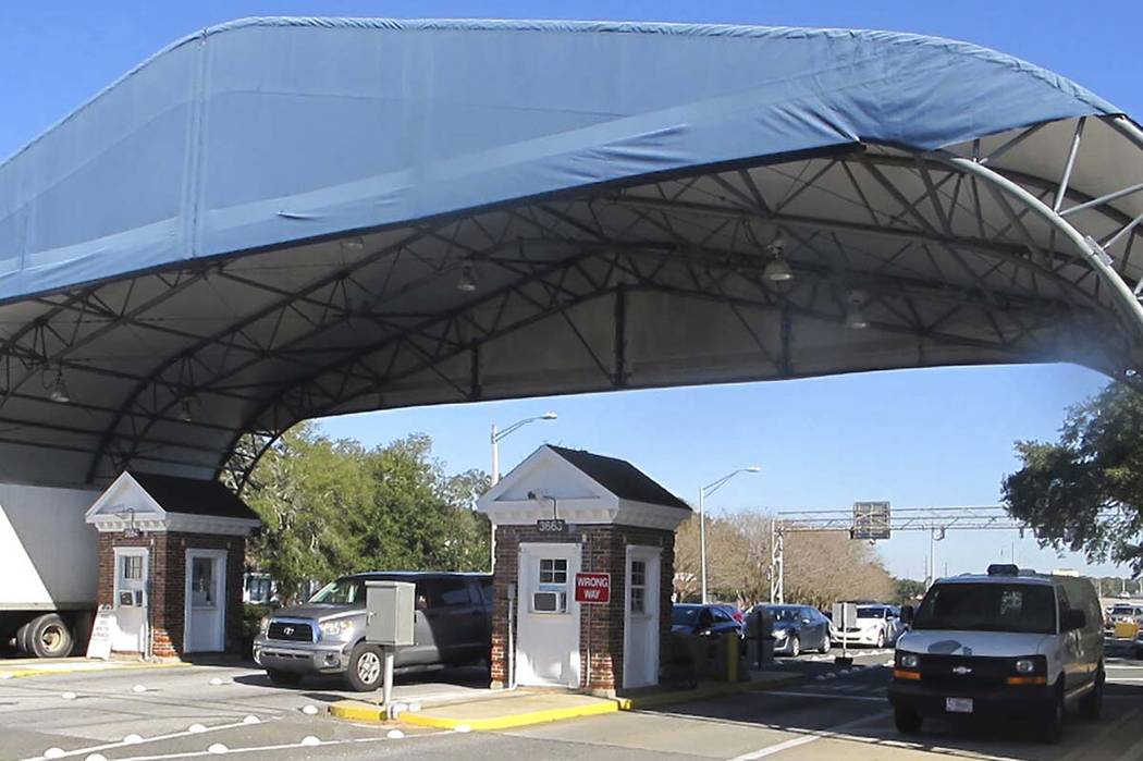 A Jan. 29, 2016, file photo shows the entrance to the Naval Air Base Station in Pensacola, Fla. ...