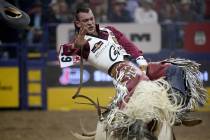 Tim O'Connell of Zwingle, Iowa rides Two Buck Chuck to a score of 88 in the Bareback Riding com ...