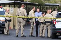 Las Vegas police investigate after a person was struck multiple times in a shooting at the Marq ...