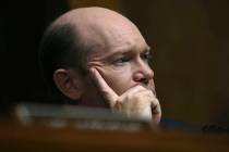 Sen. Chris Coons, D-Del., listens to testimony from Christine Blasey Ford during a Senate Judic ...