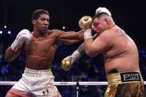 Defending champion Andy Ruiz Jr., right, during his fight against Britain's Anthony Joshua in t ...