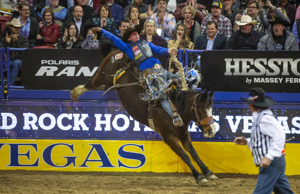 Spencer Wright of Milford, Utah, rides Hell on Hooves in Saddle Bronc Riding during the third g ...