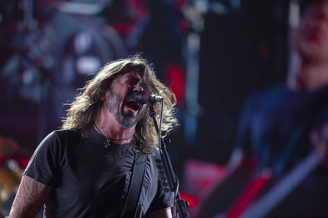 Dave Grohl of the Foo Fighters screams into the microphone on Saturday, Dec. 7, 2019, at Inters ...