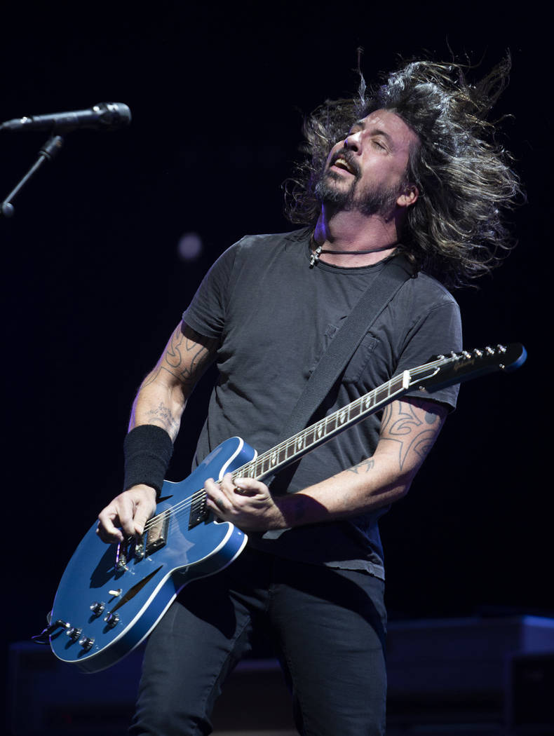 Dave Grohl of the Foo Fighters head bangs during the band's set on Saturday, Dec. 7, 2019, at I ...