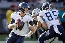 Tennessee Titans quarterback Ryan Tannehill (17) passes against the Oakland Raiders during the ...