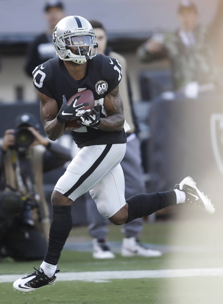 Oakland Raiders wide receiver Rico Gafford (10) catches a touchdown pass against the Tennessee ...