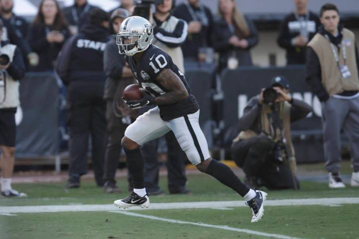 Oakland Raiders wide receiver Rico Gafford (10) catches a touchdown pass against the Tennessee ...