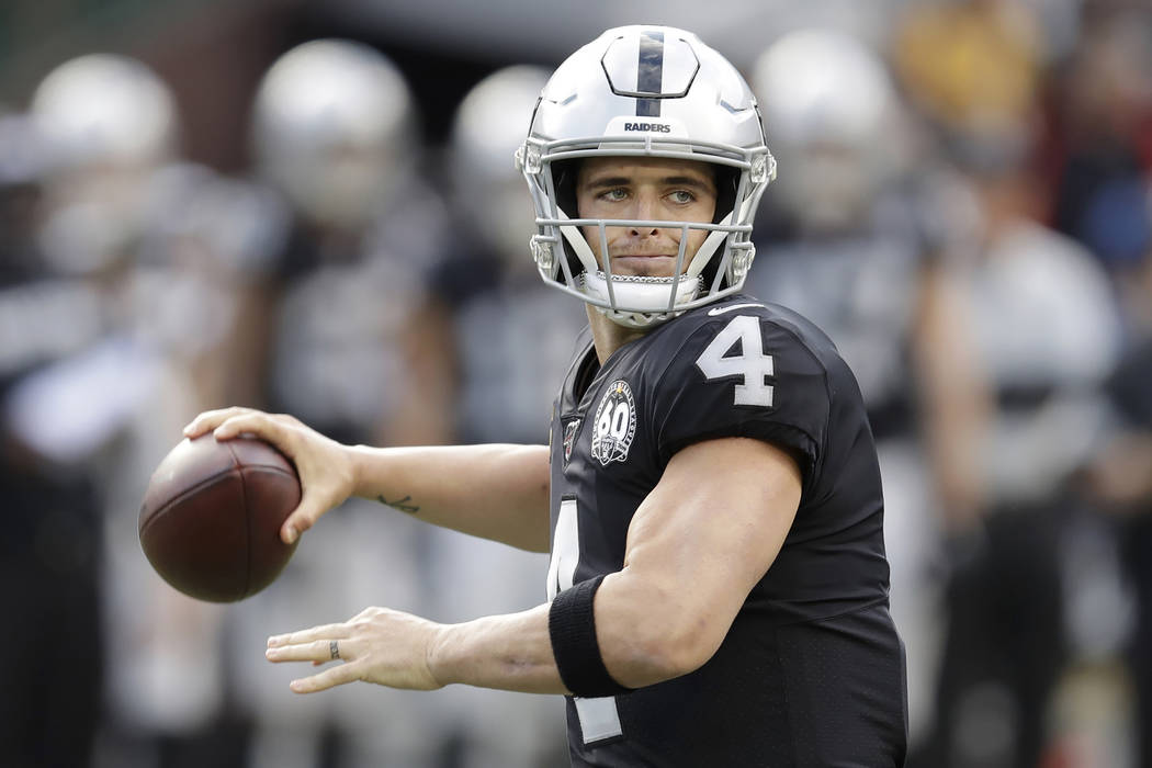 Tennessee Titans running back Derrick Henry (22) scores past Oakland Raiders free safety Erik H ...