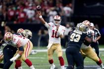 San Francisco 49ers quarterback Jimmy Garoppolo (10) passes in the first half an NFL football g ...