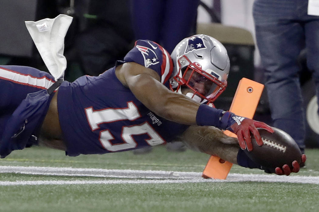 New England Patriots wide receiver N'Keal Harry dives for the pylon after catching a pass again ...