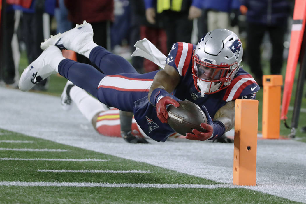 New England Patriots wide receiver N'Keal Harry dives for the pylon after catching a pass again ...