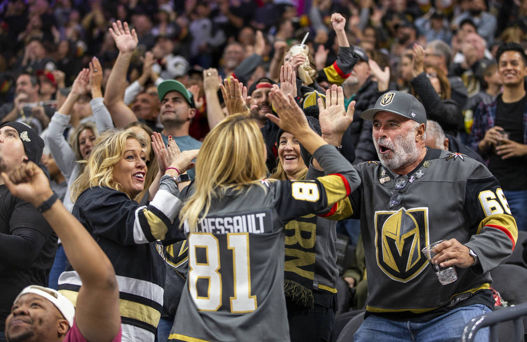 Vegas Golden Knights fans celebrate another goal over the Anaheim Ducks during the second perio ...