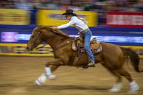 Dona Kay Rule of Minco, Okla., heads home in Barrel Racing during the third go round of the Wra ...