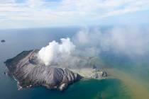 This aerial photo shows White Island after its volcanic eruption in New Zealand Monday, Dec. 9, ...
