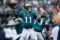 Philadelphia Eagles' Carson Wentz passes during the first half of an NFL football game against ...