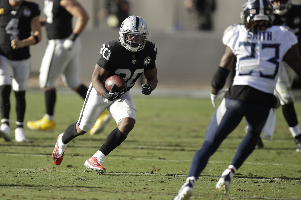 Oakland Raiders running back Jalen Richard (30) runs against the Tennessee Titans during the fi ...