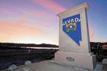 A "Welcome to Nevada" monument sign similar to the one shown along U.S. Highway 395 a ...