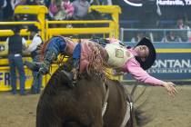 Tilden Hooper makes his run during National Finals Rodeo. Benjamin Hager Las Vegas Review-Journal