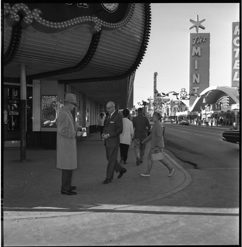 The Rev. Douglas Harrel of First Methodist Church collects donations to the Salvation Army on t ...