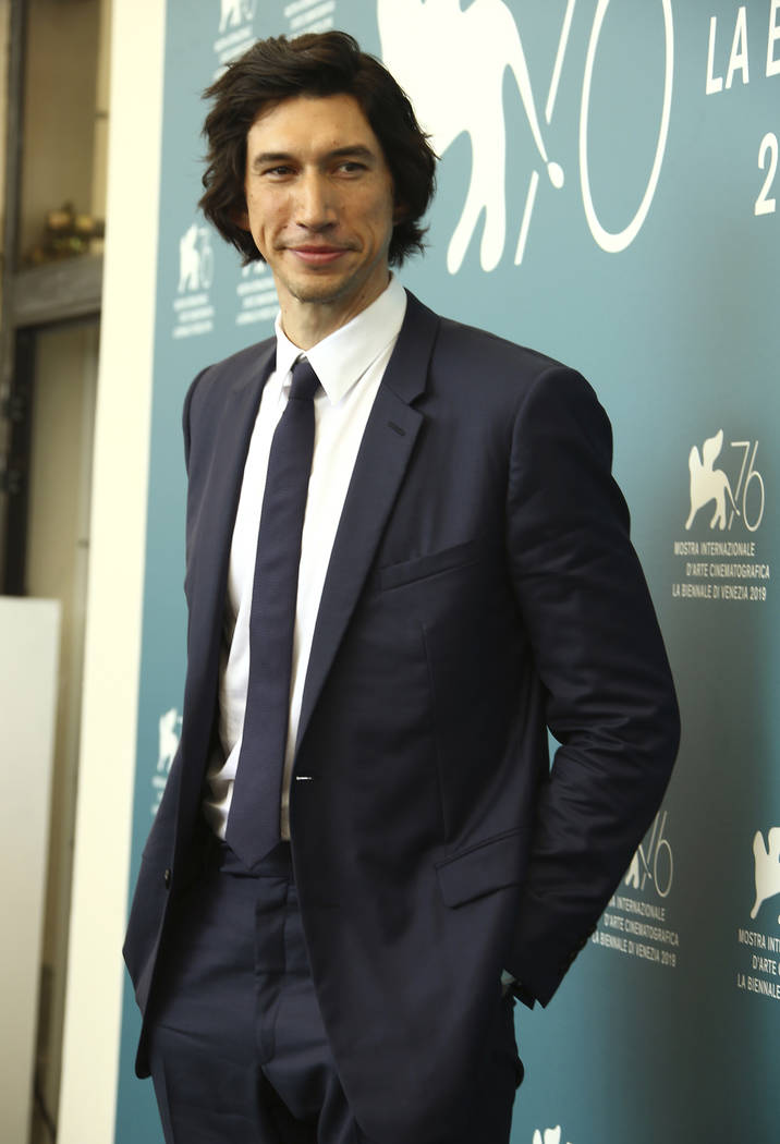 Actor Adam Driver poses for photographers at the photo call for the film 'Marriage Story' at th ...