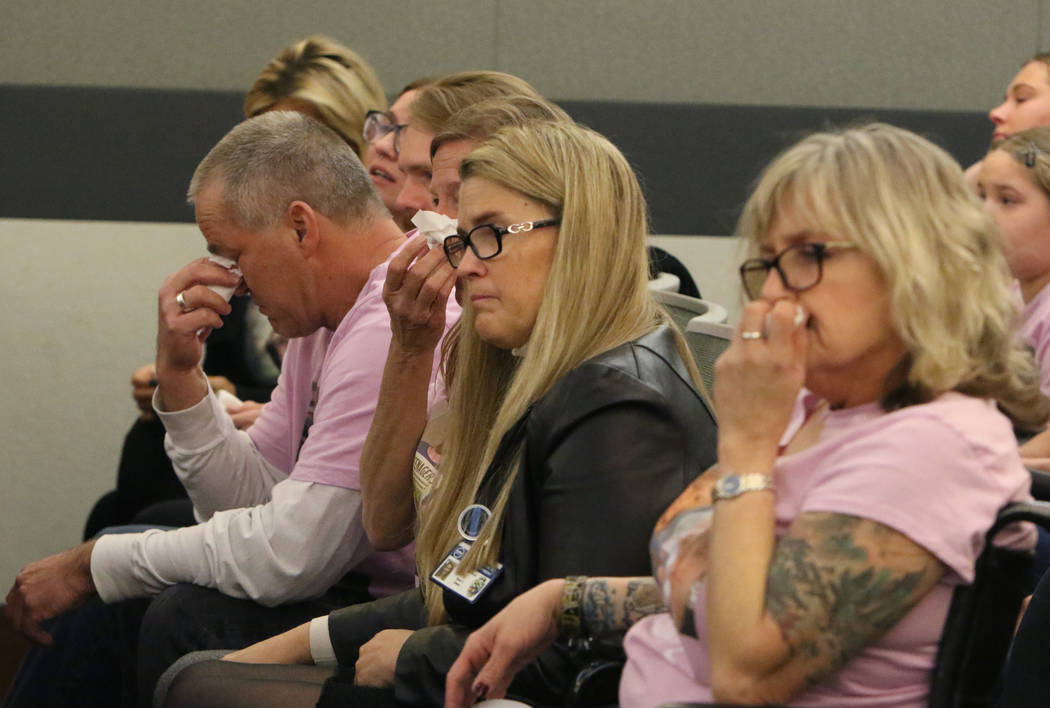 Steven Minkler, left, and his wife, Jamie, parents of murder victim Matthew Minkler, 17, weep d ...