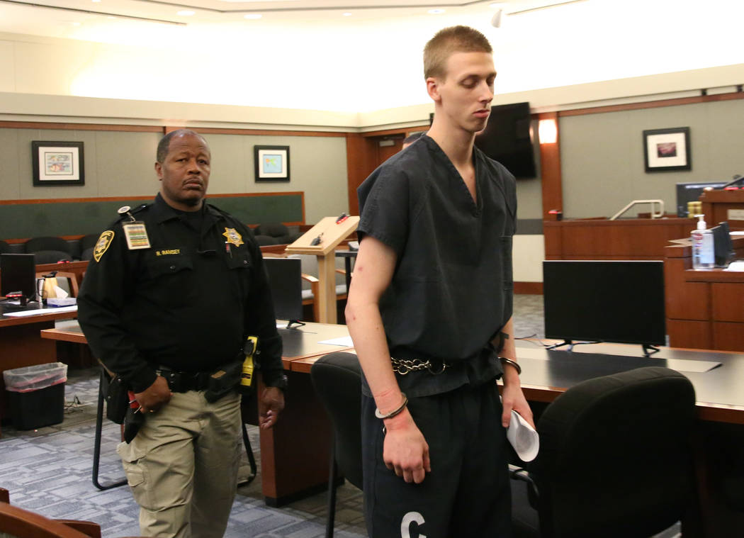 Kody Harlan, convicted in the June 2018 slaying of Matthew Minkler, 17, is escorted out of the ...