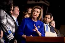House Speaker Nancy Pelosi of Calif., accompanied by House Congress members speaks at a news co ...